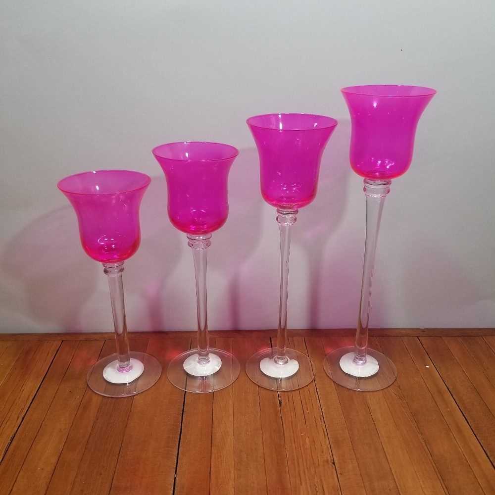 Very nice hot pink long stemmed candle holders
